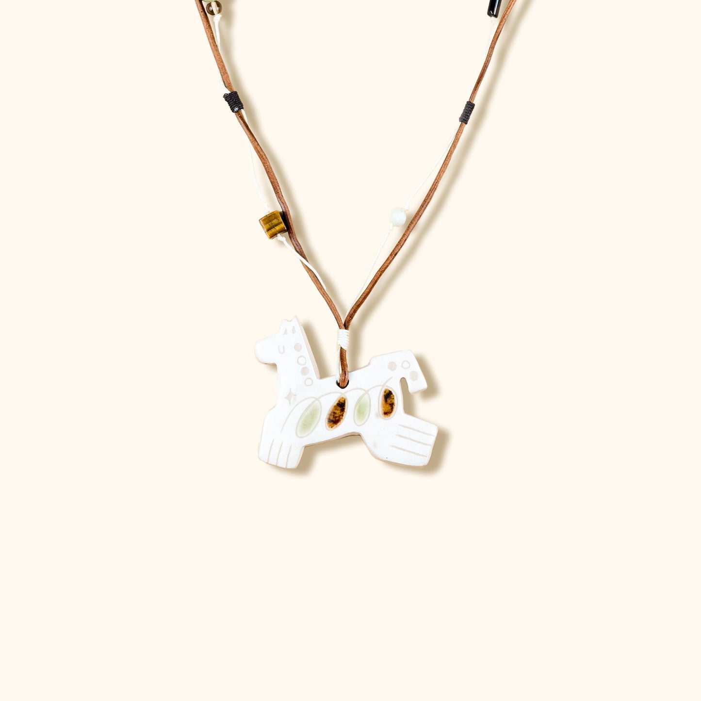 Her Market | White Infinity Pattern Whimsical 8-Leg Pony Necklace